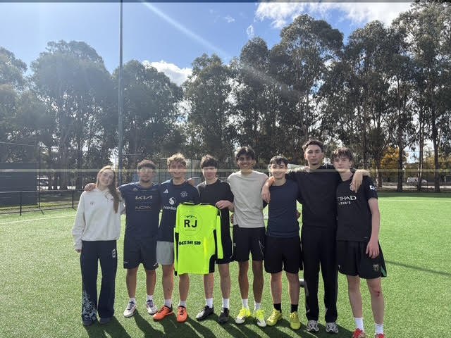 The sponsored soccer squad after a game